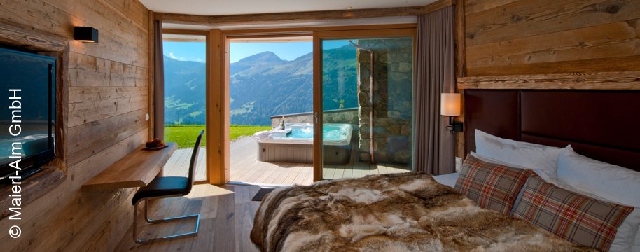 Maierl-Alm & Châlets | Kirchberg in Tirol | Ausblick mit Whirlpool | luxuszeit.com