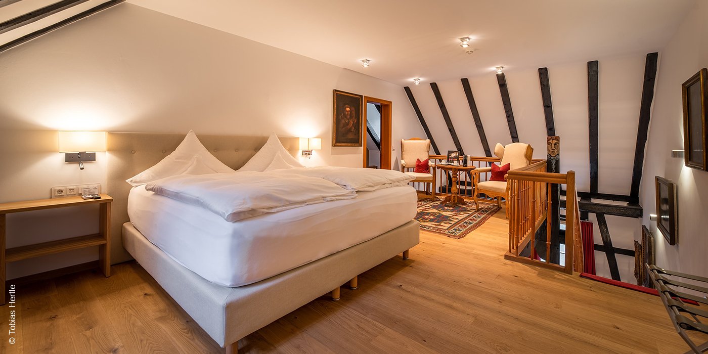 Neumühle Resort & Spa | Wartmannsroth | Maisonette-Suite Schlafbereich | luxuszeit.com